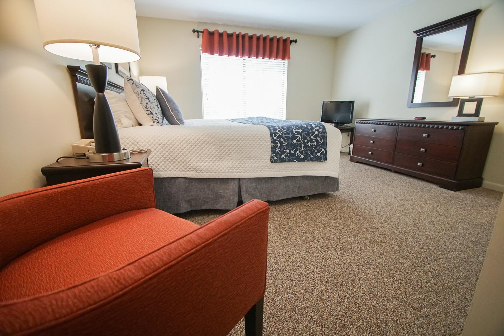 Spacious master bedroom accommodations available at VRI's Brewster Green Resort in Massachusetts.